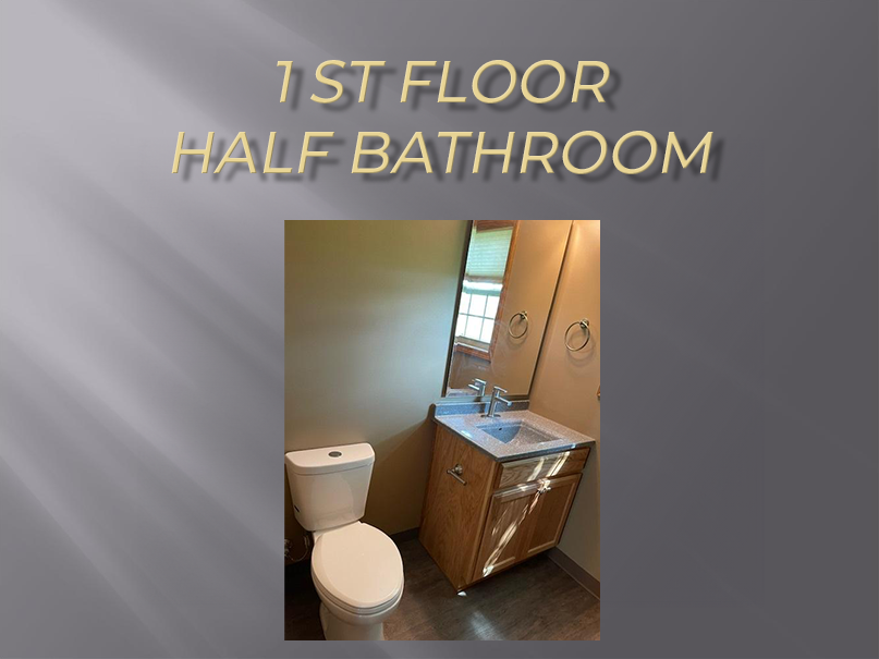 First floor half bathroom with toilet and sink.